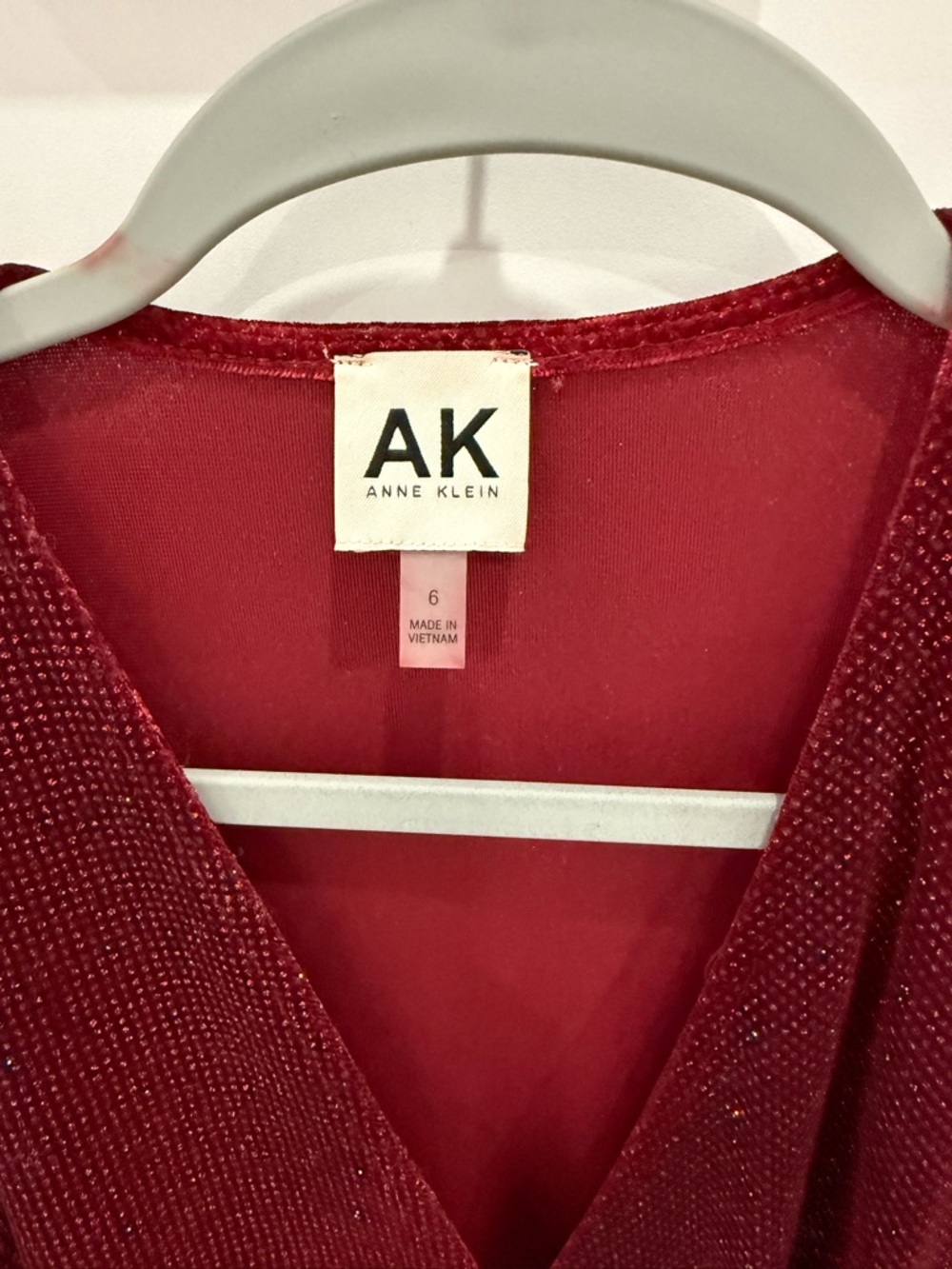 Anne Klein Sparkle Red Wrap-Style Top with Gold Logo Detail - Picture 2 of 3